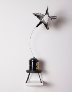 Shooting Star, 2012, Recycled aluminum cans, wire, rivets, stand, 24 inches, x 5 inches x 5 inches